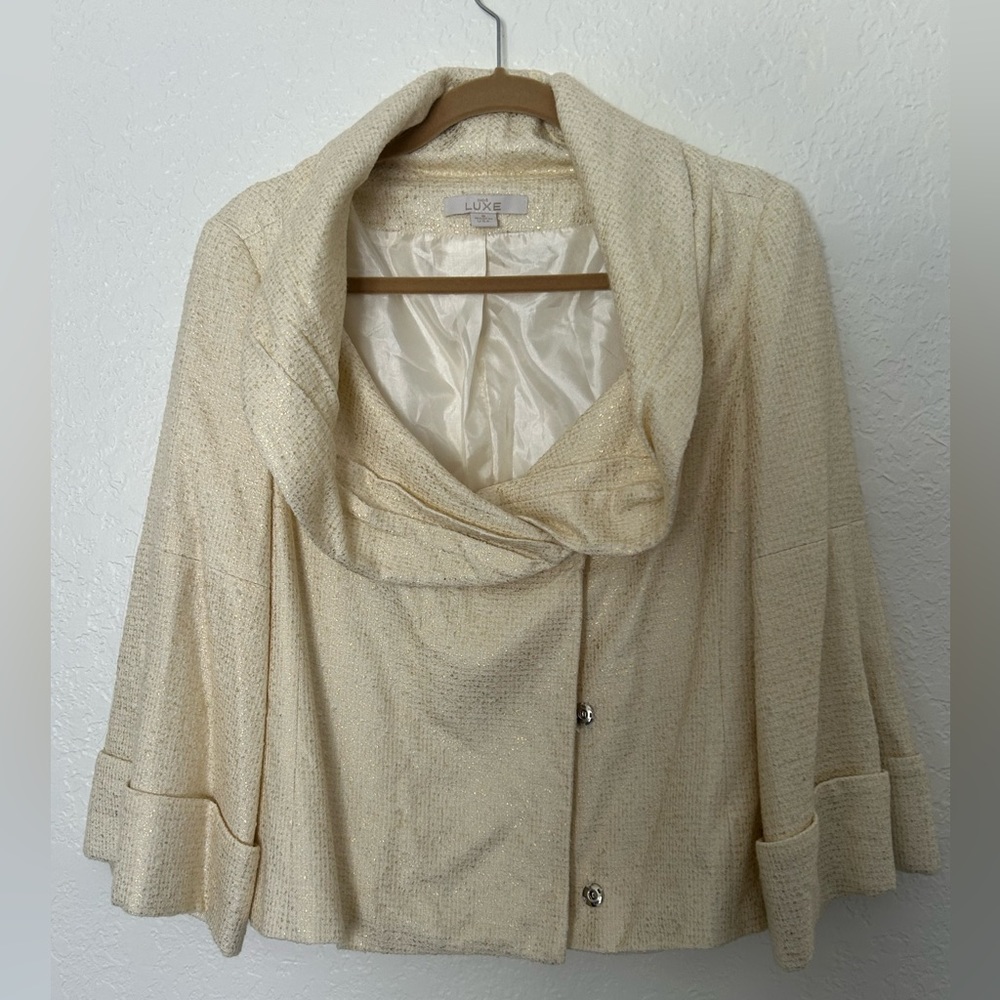 217. Cache Luxe skirt suit.